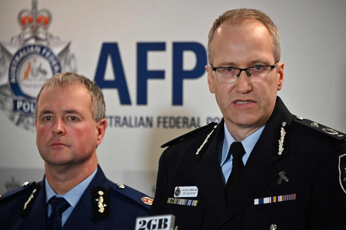Australian Federal Police (AFP) Assistant Commissioner Ian McCartney (R) and New South Wales police assistant commissioner Mick Willing address the media over an alleged plot to attack police stations, embassies and defense facilities in Sydney on July 2, 2019. (AFP/Peter Parks)