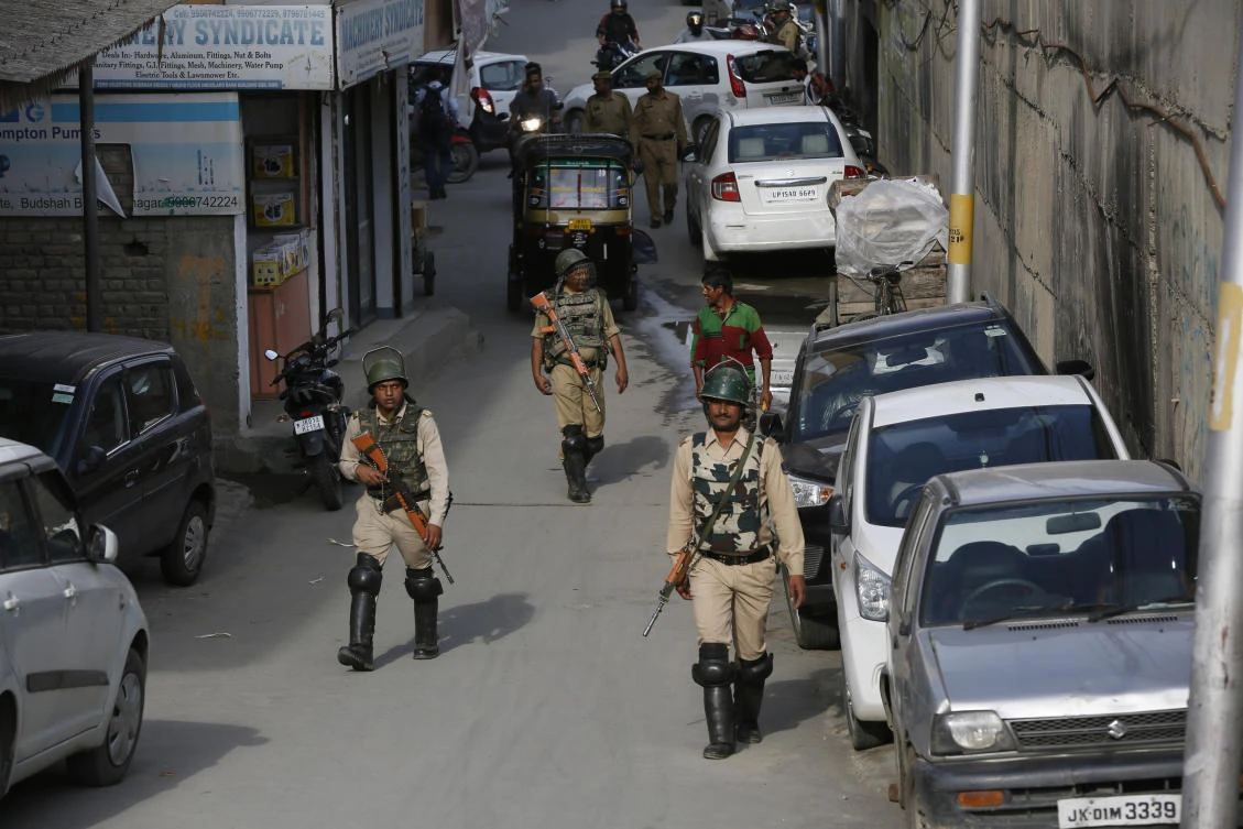 Thousands of Hindu pilgrims began the arduous trek to an icy Himalayan cave in disputed Kashmir on Monday, with tens of thousands of Indian government forces guarding roads and mountain passes. (AP)