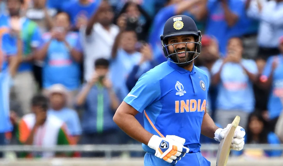 Sharma ton helps India seal World Cup semi-final spot