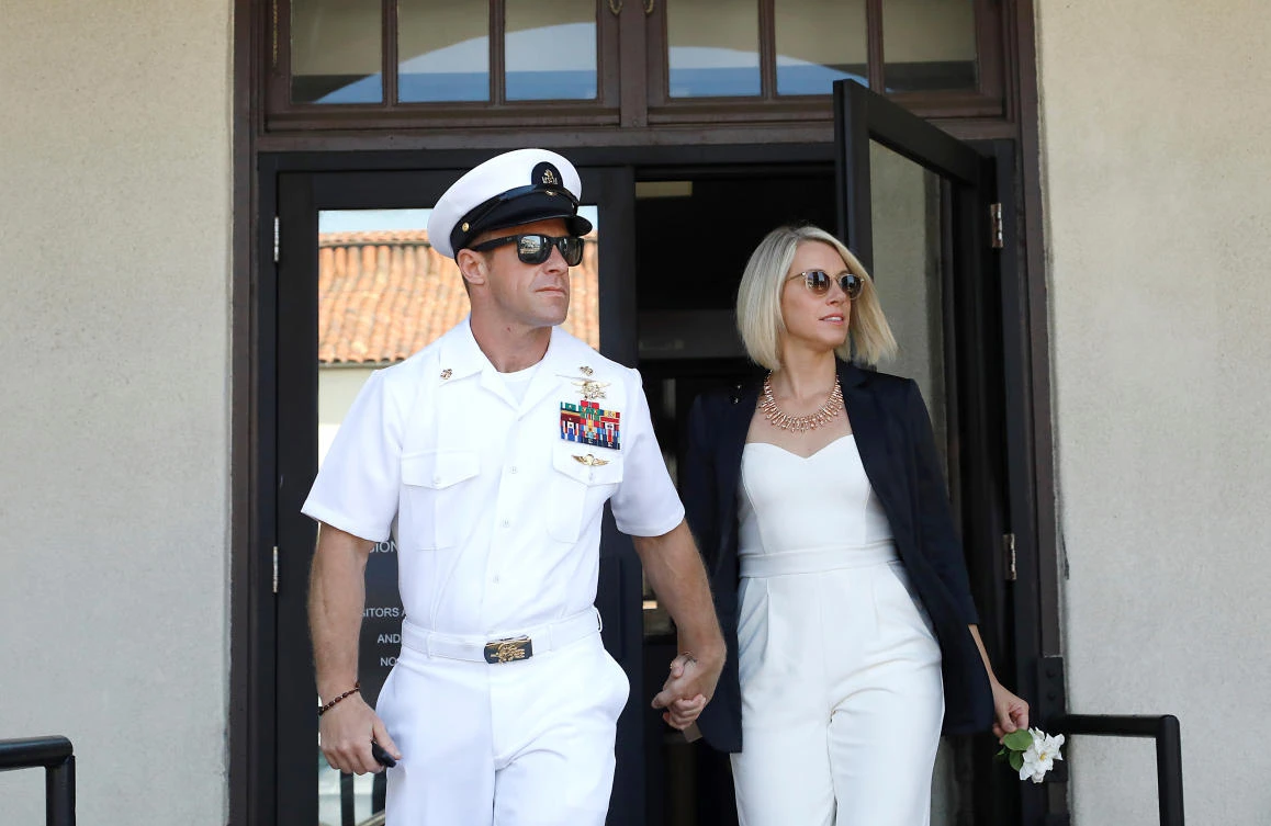 US Navy SEAL Special Operations Chief Edward Gallagher leaves for a lunch break with his wife from his court-martial trial in San Diego. (Reuters)