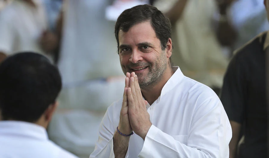 In this May 21, 2019, file photo, Congress Party President Rahul Gandhi, greets people during a function in New Delhi, India. Gandhi has resigned as president of India's opposition Congress party to take responsibility for its crushing defeat in recent elections. (AP Photo/Manish Swarup, File)