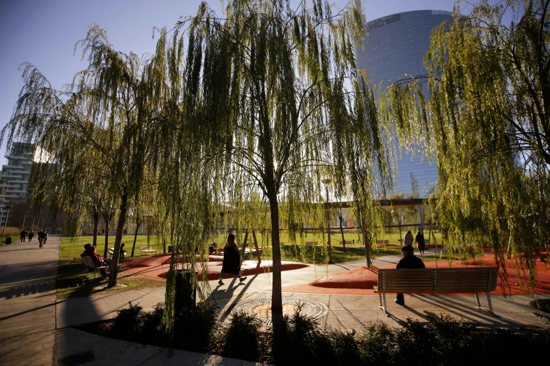In this Dec. 4, 2018 file photo, people walk in Tree Library park in Milan, Italy. (AP)