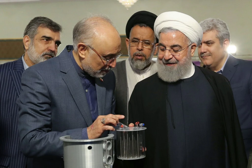Iranian President Hassan Rouhani and Iran's nuclear technology organisation chief Ali Akbar Salehi during the "nuclear technology day" in Tehran in April. (HO / Iranian Presidency / AFP)