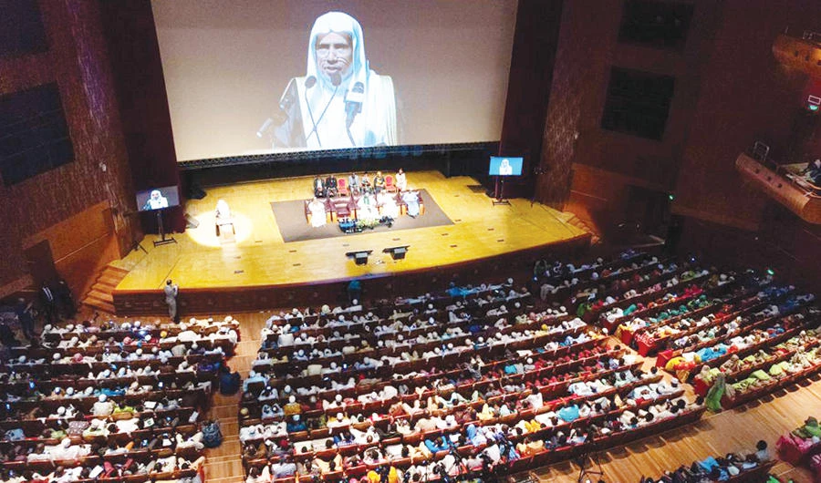 Muslim World League Secretary-General Dr. Mohammed bin Abdul Karim Al-Issa speaks during a conference in Dakar. (SPA)