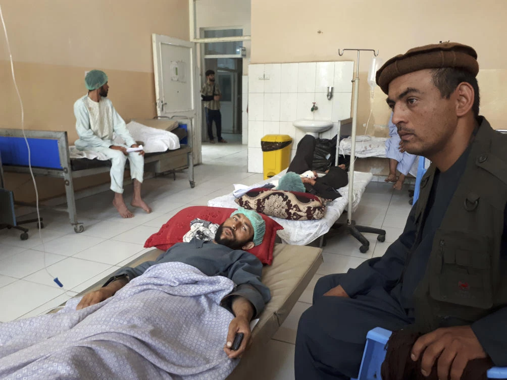 Wounded men receive treatment in a hospital after a Taliban attack in the Nahrin district of Baghlan province north of Kabul, Afghanistan. (AFP file photo)