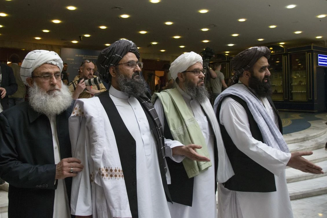 Mullah Abdul Ghani Baradar, second from left, and other Taliban leaders arrive for talks during an earlier round of negotiations in Moscow, Russia on May 28, 2019. (AP)