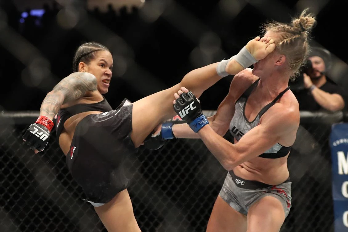 Amanda Nunes of Brazil knocks out Holly Holm of the United States during their UFC Womens Bantamweight Title bout at T-Mobile Arena on July 06, 2019 in Las Vegas, Nevada. (AFP)