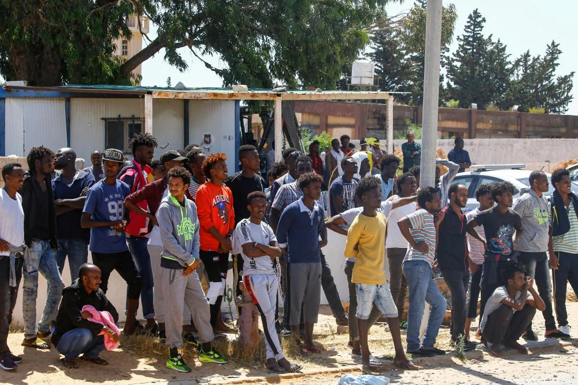 Over 40 migrants were killed in an air strike early late on July 2 on their detention center in a Tripoli suburb. (AFP)
