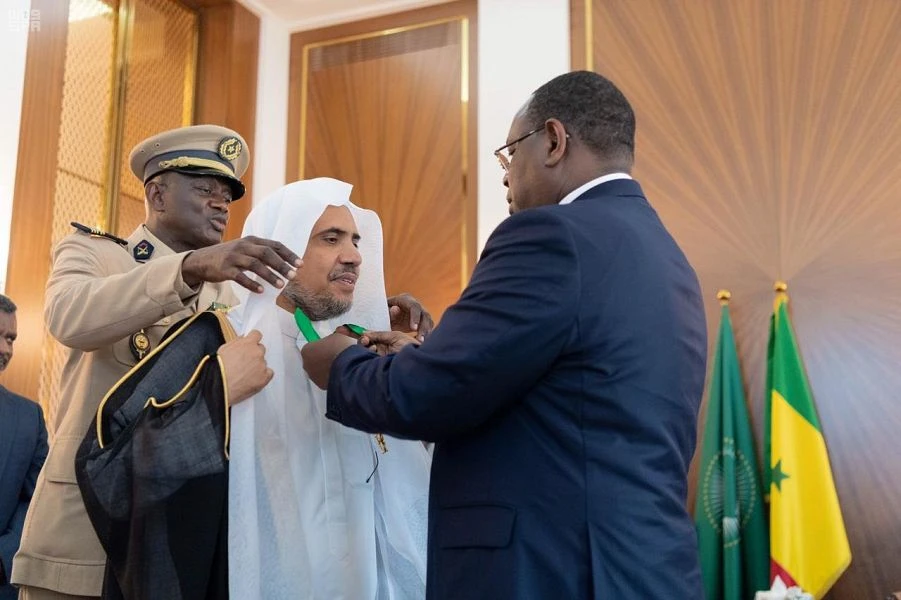 Senegal president honors Muslim World League chief for efforts to spread moderation