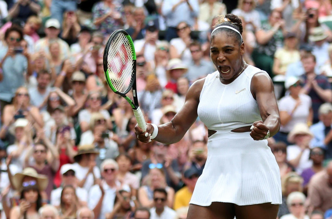 Serena Williams of the US celebrates winning her quarterfinal match against Alison Riske of the US to go into the semifinals of Wimbledon. (Reuters)