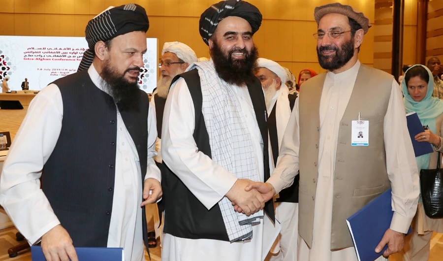 Members of Afghan delegations attend the second day of the Intra Afghan Dialogue talks in the Qatari capital Doha on July 8, 2019. (AFP)