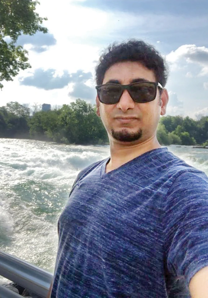 Adawi left his family in their car on Sunday while he took photos of the waterfall. (Social media)