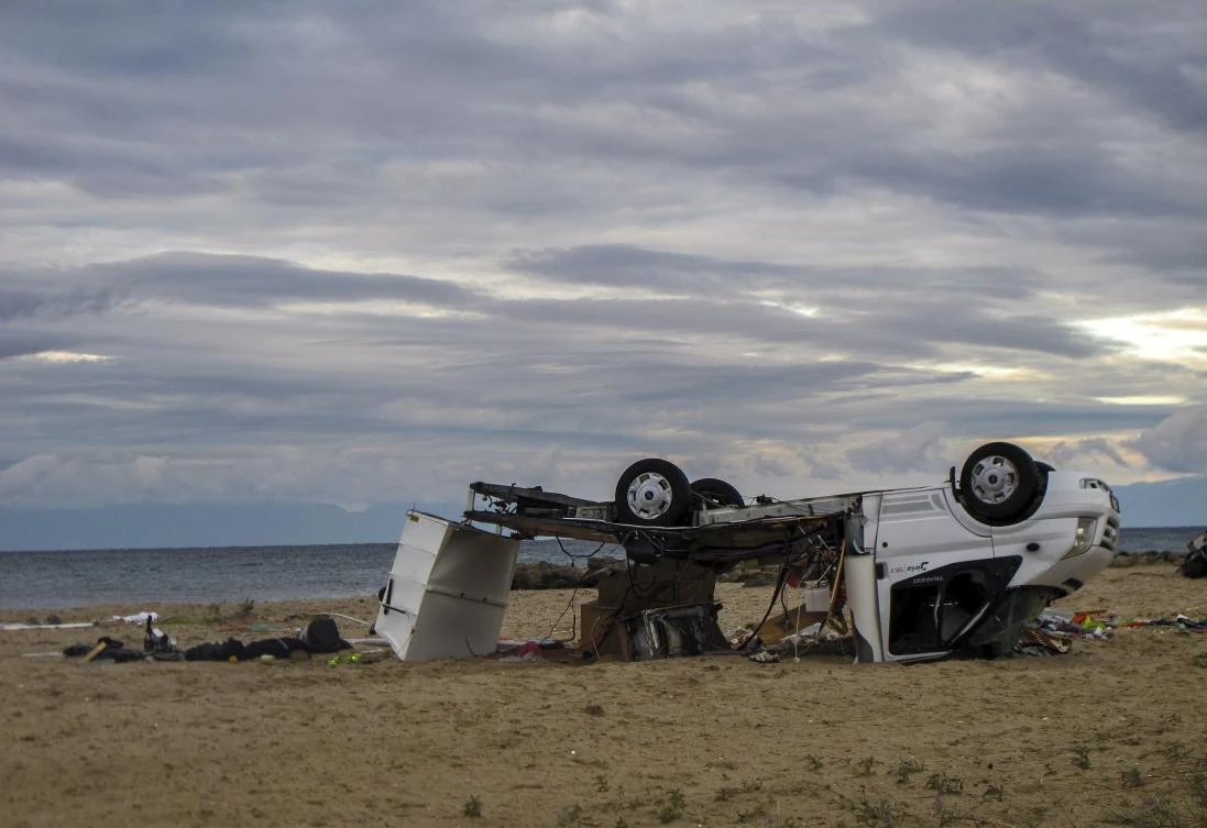 The freak storm, which only lasted about 20 minutes, hit the popular tourist Halkidiki region and overturned cars. (InTime News via AP)