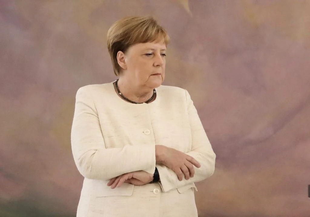 German Chancellor Angela Merkel has suffered three bouts of uncontrolled shaking in public. (AFP)