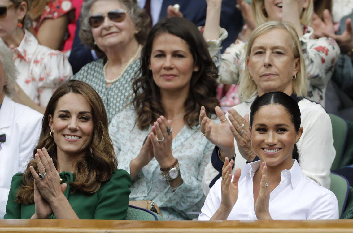 Kate, Duchess of Cambridge, and Meghan, Duchess of Sussex applaud as they sit in the Royal Box on Centre Court to watch the women's singles final match between Serena Williams and Simona Halep at the Wimbledon Tennis Championships in London, Saturday, July 13, 2019. (AP)