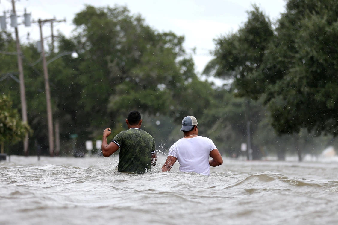 Rainfall estimates had been lowered to between 20 to 38 centimeters but rivers and canals across South Louisiana were full, and caused flooding in some streets. (Reuters)