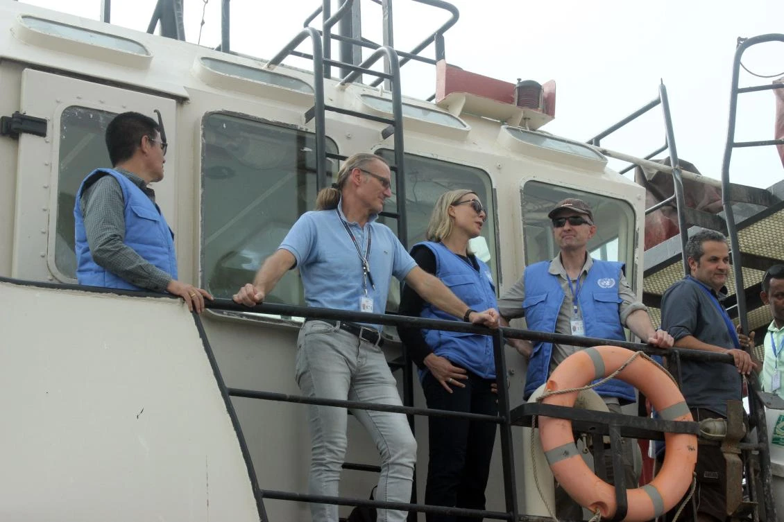 Representatives of the UN Redeployment Coordination Committee (RCC) attend a joint meeting with representatives of the Yemeni government and the Houthi militants on a vessel off the coast on Sunday. (AFP)