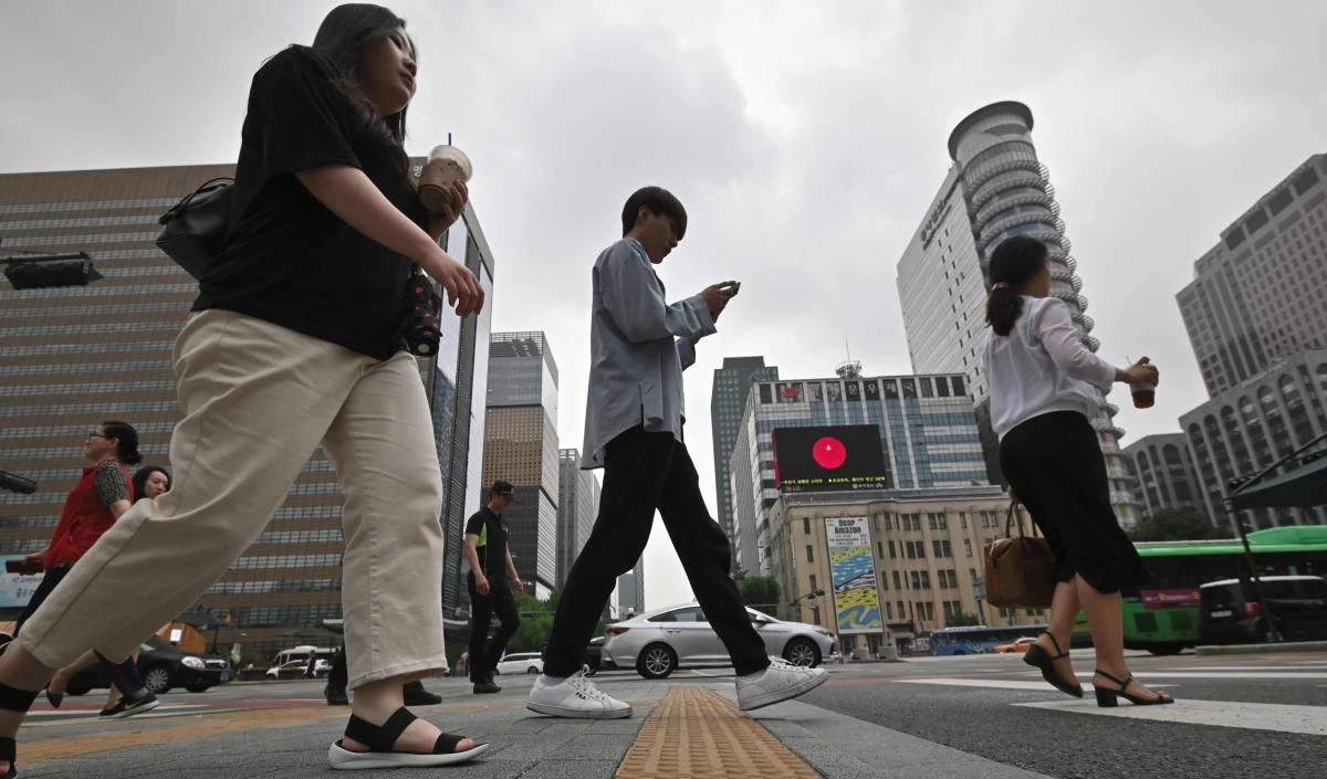 New legislation that comes into effect on July 16 will criminalize business owners who unfairly dismiss employees harassed at work in South Korea. (AFP)
