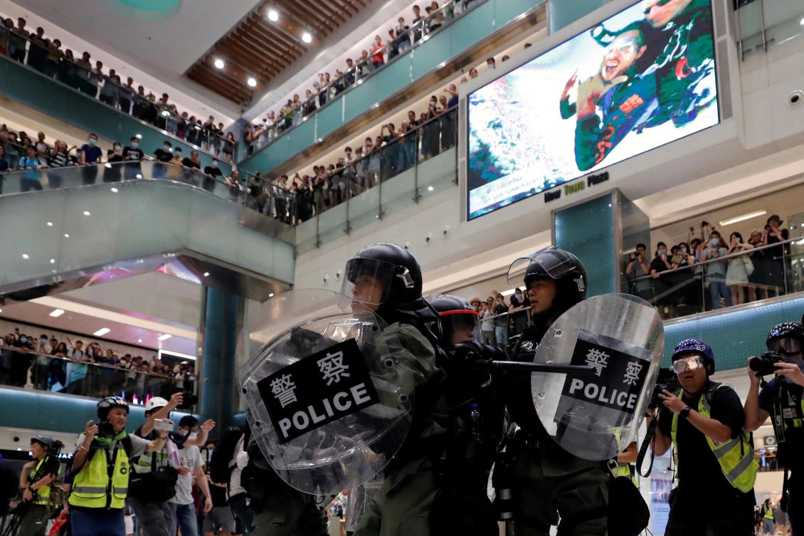 Riot police try to disperse pro-democracy protesters inside a mall after a march at Sha Tin District of East New Territories, in Hong Kong, China July 14, 2019. (Reuters)