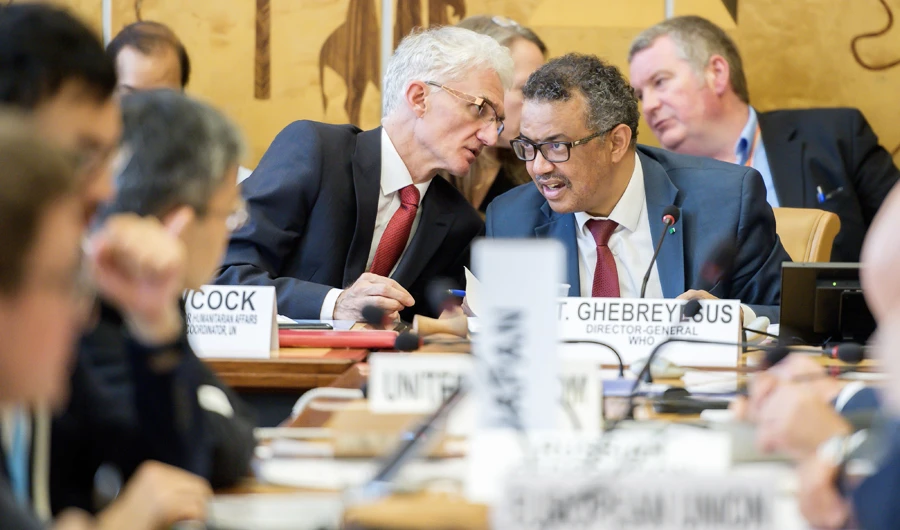 World Health Organization (WHO) director-general Tedros Adhanom Ghebreyesus (C - R) listens to UN Under-Secretary-General for Humanitarian Affairs and Emergency Relief Coordinator Mark Lowcock during a meeting hold by the United Nations on the Ebola disease in Democratic Republic of Congo, on July 15, 2019, in Geneva. (AFP)