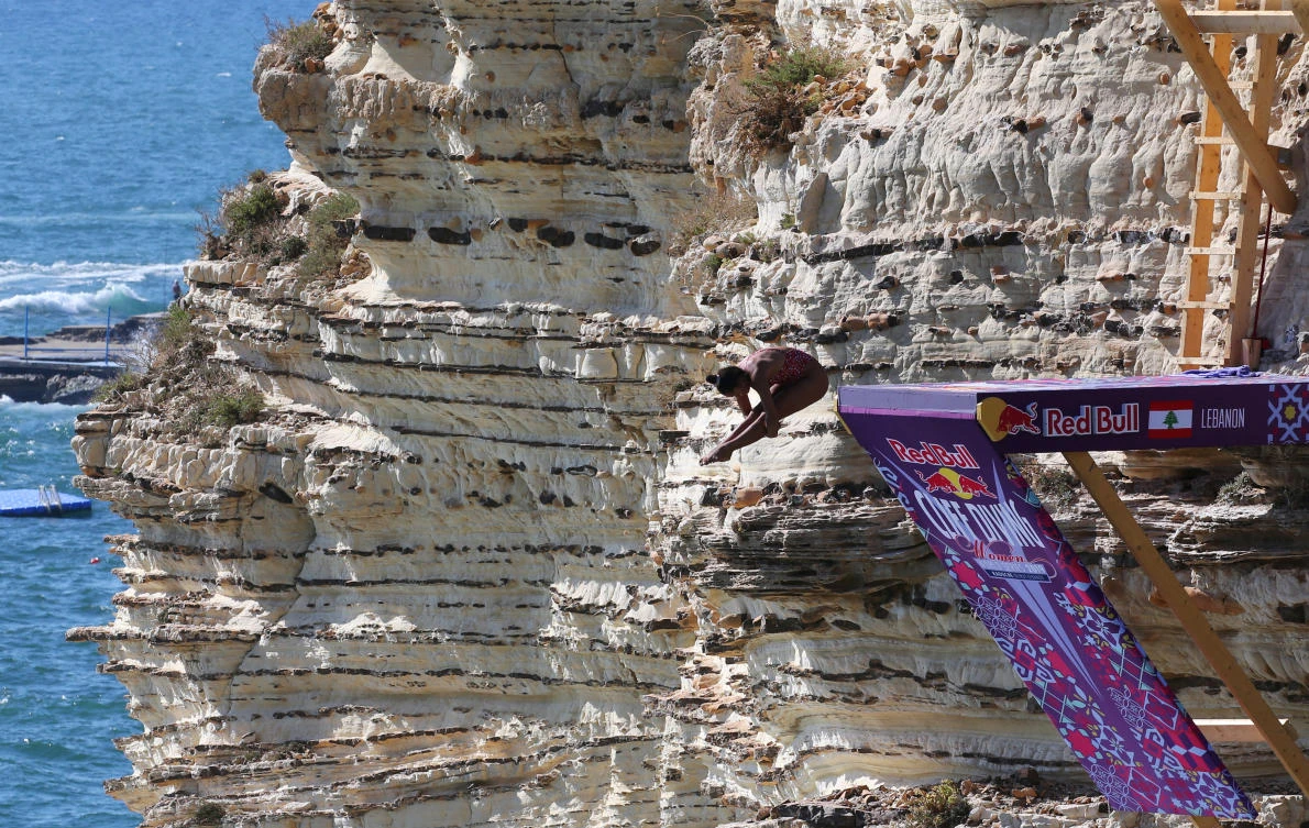 Cliff divers leap from Beirut landmark in international tour
