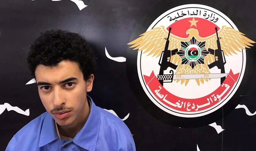 Manchester bombing suspect appears in London court, denies charges