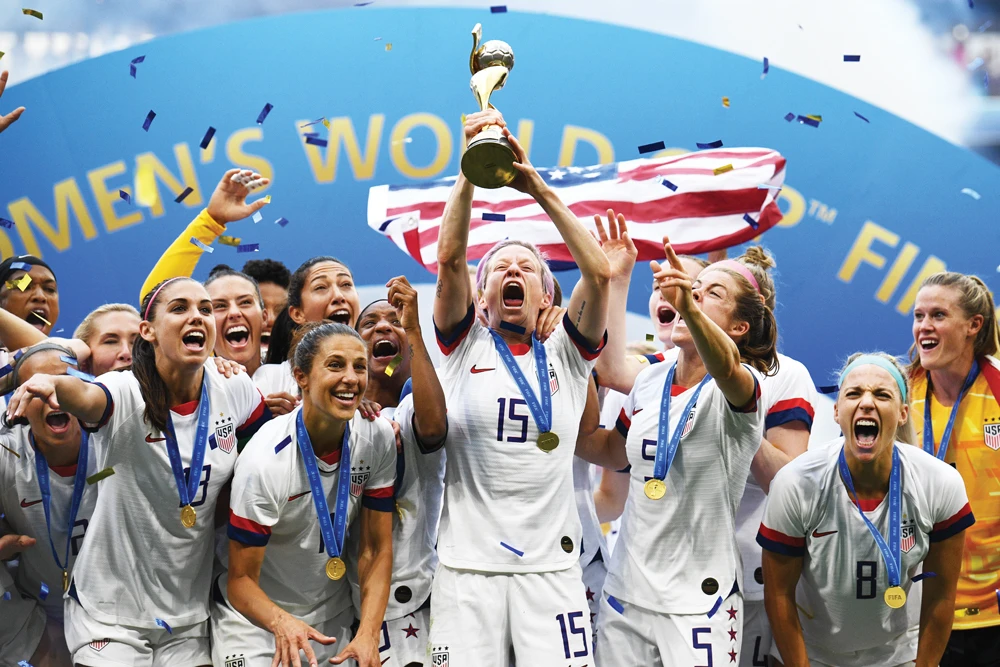 USA’s players celebrate their victory in the final. (AFP)