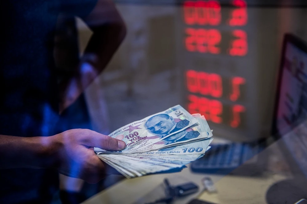 Turkey's troubled lira tumbled on August 13, 2018 to fresh record lows against the euro and dollar, piling pressure on stock markets on fears the country's crisis could spill over into the world economy.