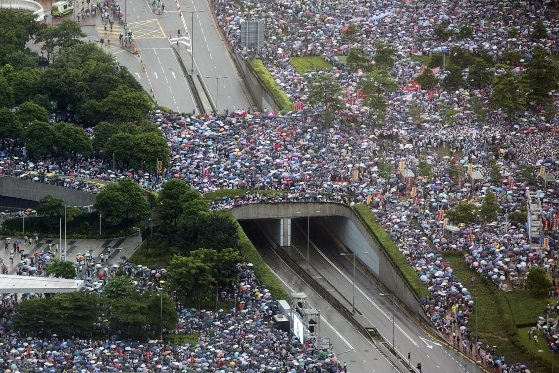 Hong Kong protesters continue past march’s end point