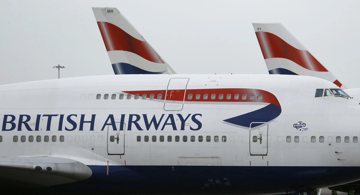 File photo shows British Airways planes parked at Heathrow Airport in London. On Saturday, July 20, 2019, British Airways said it is canceling flights to Cairo for a week for unspecified security reasons. (AP)