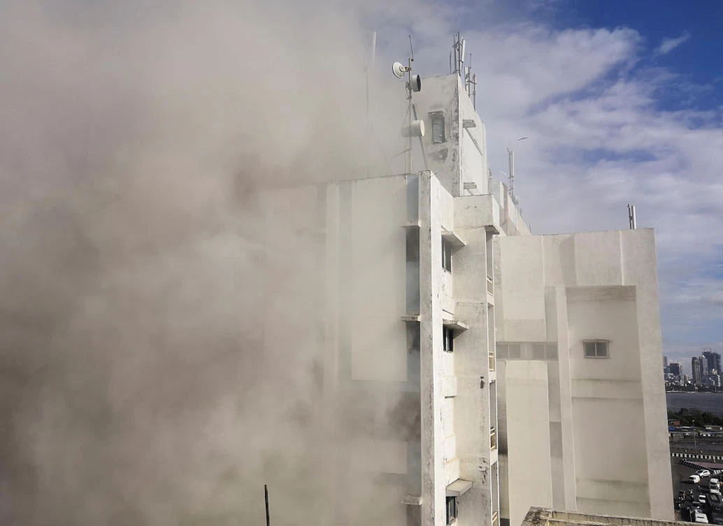 Smoke is seen coming out of a Mahanagar Telephone Nigam Limited (MTNL) building after a fire broke out, in Mumbai, India July 22, 2019. (Reuters)
