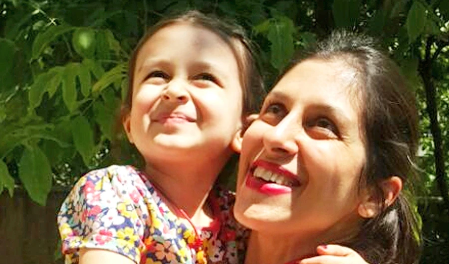 In this undated photo provided by the Free Nazanin Campaign, Nazanin Zaghari-Ratcliffe hugs her daughter Gabriella, in Iran. (AP)