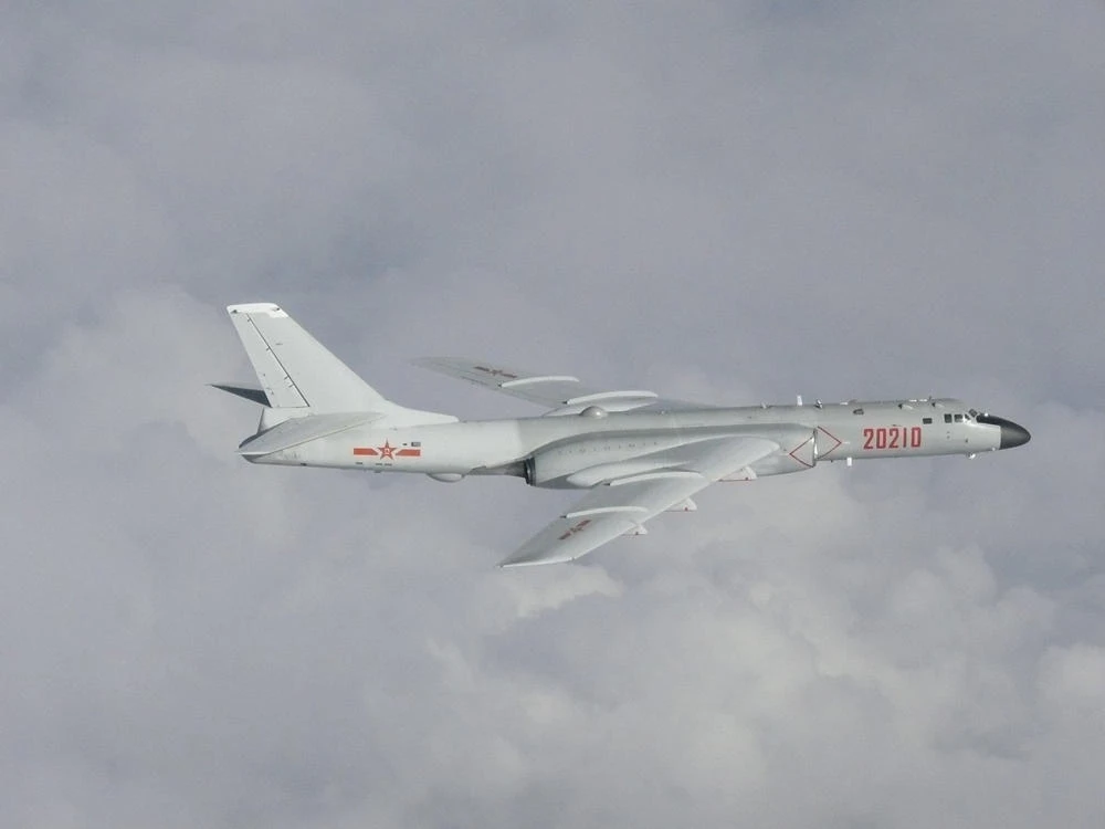 A Chinese H-6 bomber flies over East China Sea in this handout picture taken by Japan Air Self-Defense Force and released by the Joint Staff Office of the Defense Ministry of Japan July 23, 2019. China says it will not “renounce the use of force” in efforts to reunify Taiwan with the mainland. (REUTERS)
