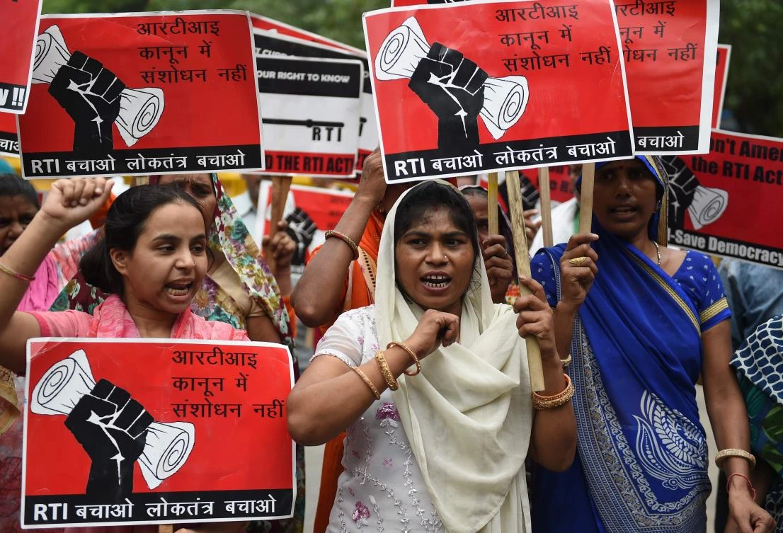 Activists shout slogans during a protest against the amendments to the Right to Information (RTI) Act in the Lok Sabha of the Indian parliament, in New Delhi on July 25, 2019. (AFP)