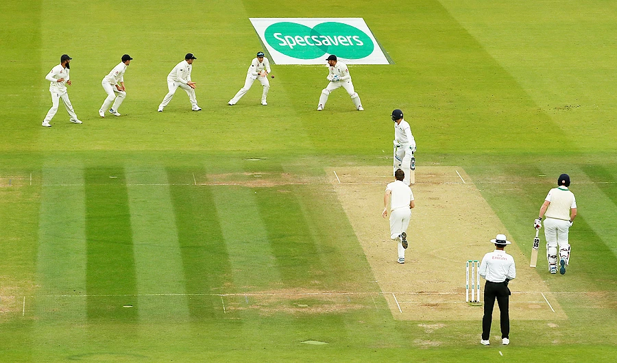 England's Joe Root takes the catch to dismiss Ireland's James McCollum. (Reuters)