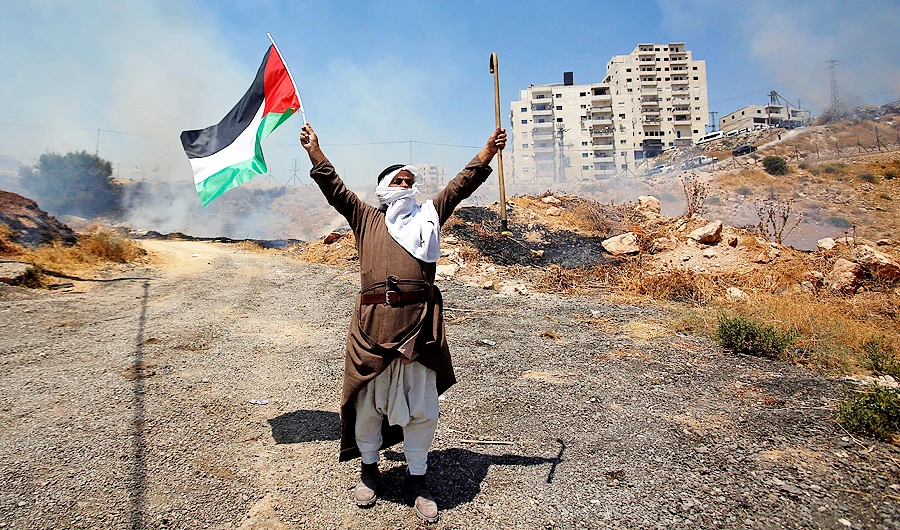 President Mahmoud Abbas made the announcement at a combined meeting of senior Palestinian leaders on Thursday night. (Reuters)