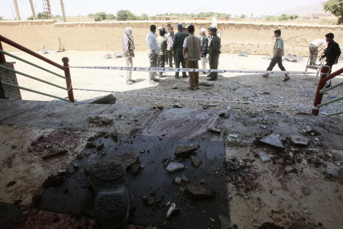 Afghan officials inspect the site of attack in Samangan province on Saturday. (File/Reuters)