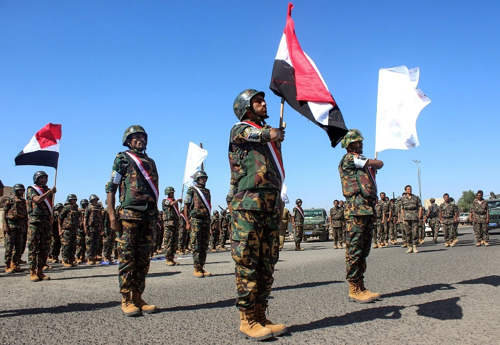 Yemeni Soldiers loyal to the Shiite Huthi rebels line-up during a graduation ceremony for a new batch of cadets in the northwestern city of Saada on March 2, 2019. (File/AFP)