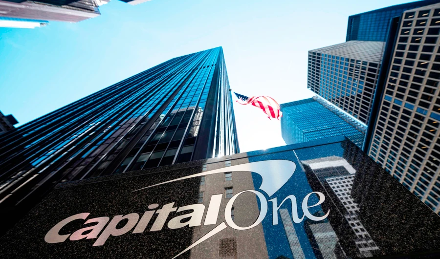 In this file photo taken on April 17, 2019 A US flag flies above the Capital One Bank Headquarters in New York City. (AFP)