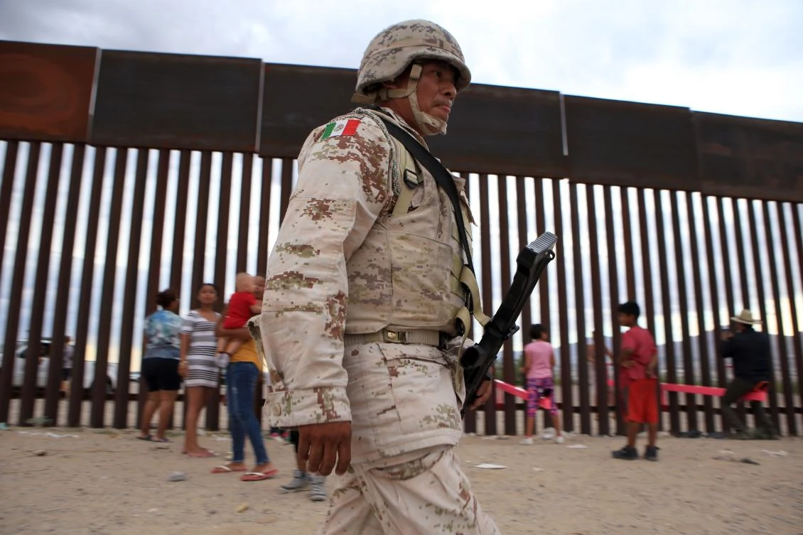 Seesaws let kids on each side of US-Mexico border play together