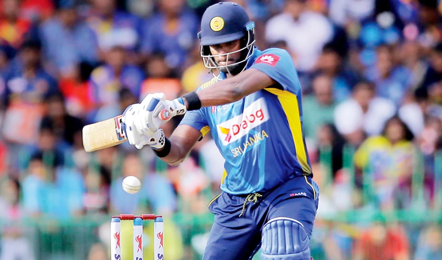 Sri Lanka's Angelo Mathews plays a shot during the third One-Day International cricket match against Bangladesh. (AP)