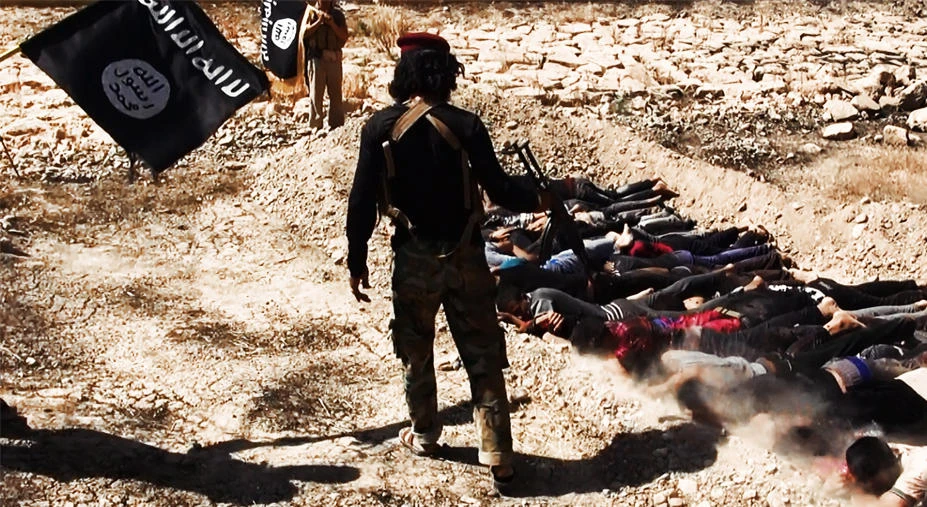 This file photo uploaded on June 14, 2014 on the jihadist website Welayat Salahuddin allegedly shows militants of Daesh executing dozens of captured Iraqi security forces members at an unknown location in the Salaheddin province. (AFP)