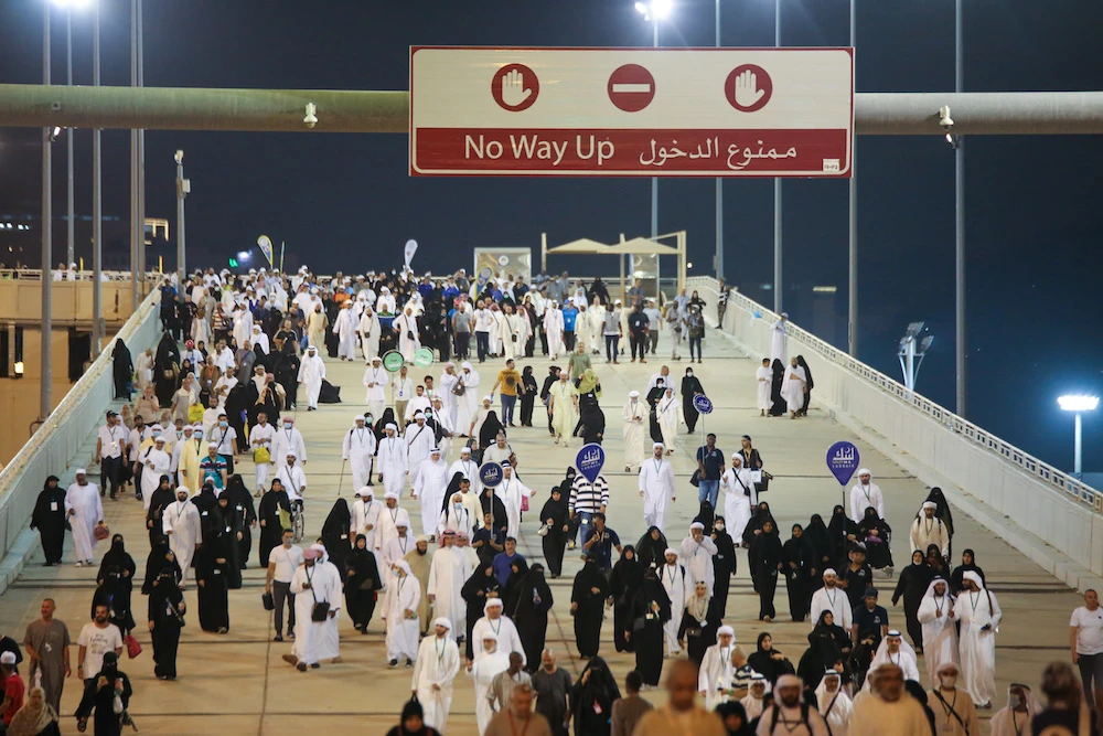 Pilgrims take part in the Jamrat Al-Aqabah ceremony, part of the Hajj pilgrimage at Islam's holiest sites, in a routine that symbolizes stoning the devil. (AN Photo/Essam Al-Ghalib)