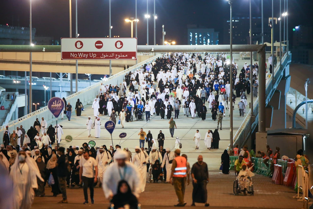 Pilgrims take part in the Jamrat Al-Aqabah ceremony, part of the Hajj pilgrimage at Islam's holiest sites, in a routine that symbolizes stoning the devil. (AN Photo/Essam Al-Ghalib)