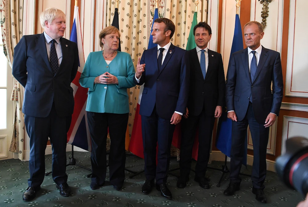 Britain’s Prime Minister Boris Johnson, French President Emmanuel Macron, German Chancellor Angela Merkel, Italy’s acting Prime Minister Giuseppe Conte and European Council President Donald Tuska ttend the G7 summit, in Biarritz, France Aug. 24, 2019. (Reuters)