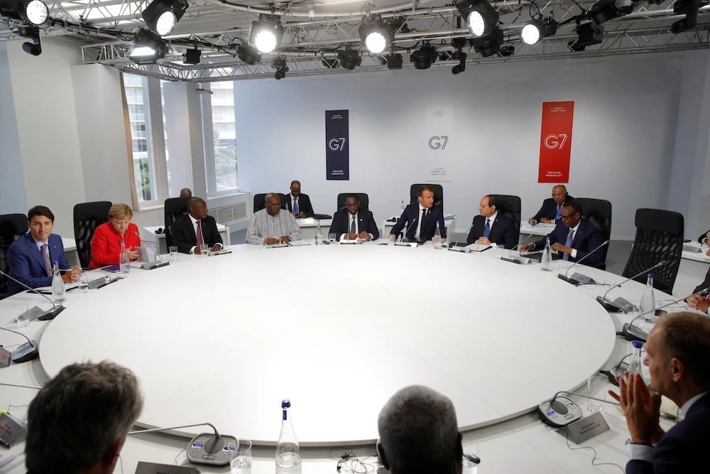 French President Emmanuel Macron, South African President Cyril Ramaphosa, President of Burkina Faso Roch Marc Christian Kabore, Egypt’s President Abdel-Fattah El-Sisi, Senegal’s President Macky Sall and Rwanda’s President Paul Kagame, G7 world leaders and leaders of international organizations arrive to attend a working session on “G7 Partnership with Africa” during the G7 summit in Biarritz, France, Aug. 25, 2019. (Reuters)