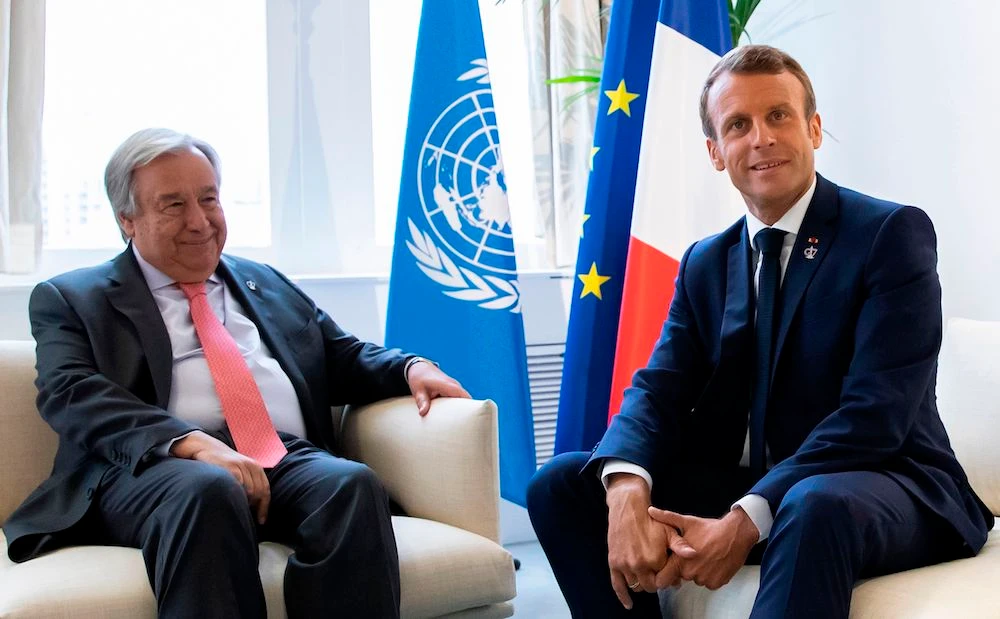 French President Emmanuel Macron (R) speaks with United Nations (UN) Secretary-General Antonio Guterres during a bilateral meeting as part of the second day of the annual G7 Summit, in Biarritz, south-west France on Aug. 25, 2019. (AFP)