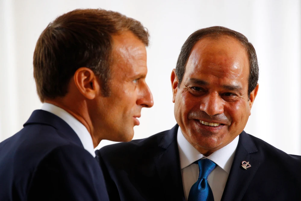 French President Emmanuel Macron welcomes Egyptian President Abdel-Fattah El-Sisi Sunday, Aug. 25, 2019 in Biarritz. (AP)