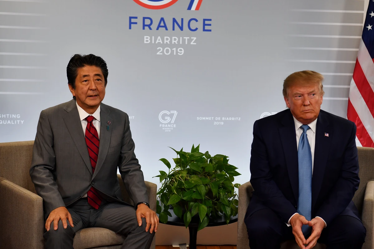 Japan’s Prime Minister Shinzo Abe (L) and US President Donald Trump take part in a bilateral meeting at the Bellevue center in Biarritz, south-west France on Aug. 25, 2019, on the second day of the annual G7 Summit attended by the leaders of the world’s seven richest democracies, Britain, Canada, France, Germany, Italy, Japan and the United States. (AFP)