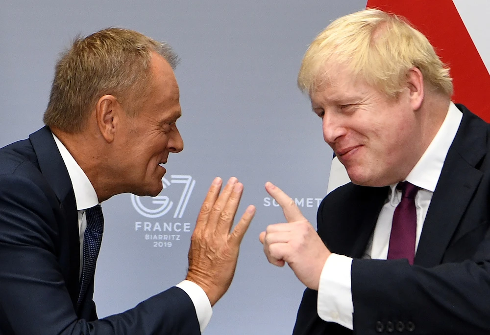 Britain’s Prime Minister Boris Johnson meets European Union Council President Donald Tusk at a bilateral meeting during the G7 summit in Biarritz, France Aug. 25, 2019. (Reuters)